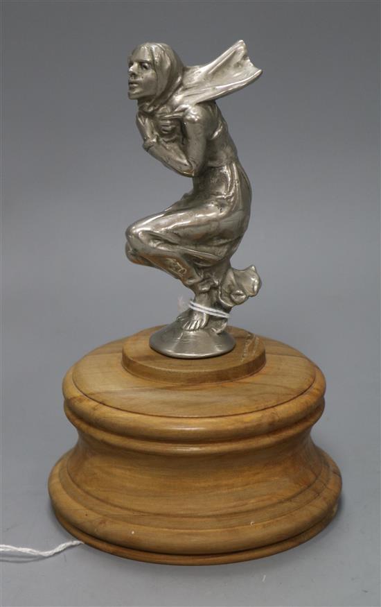 An Art Deco Windy Lady car mascot, on wood stand height 18cm